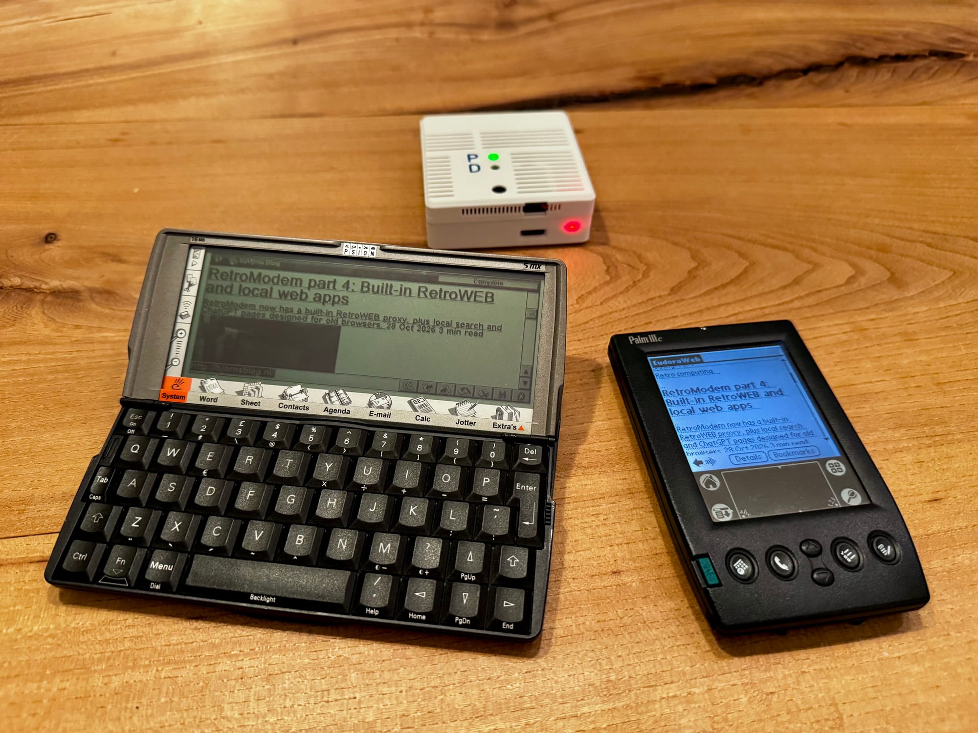 RetroModem providing internet access to a Psion 5mx and Palm IIIc